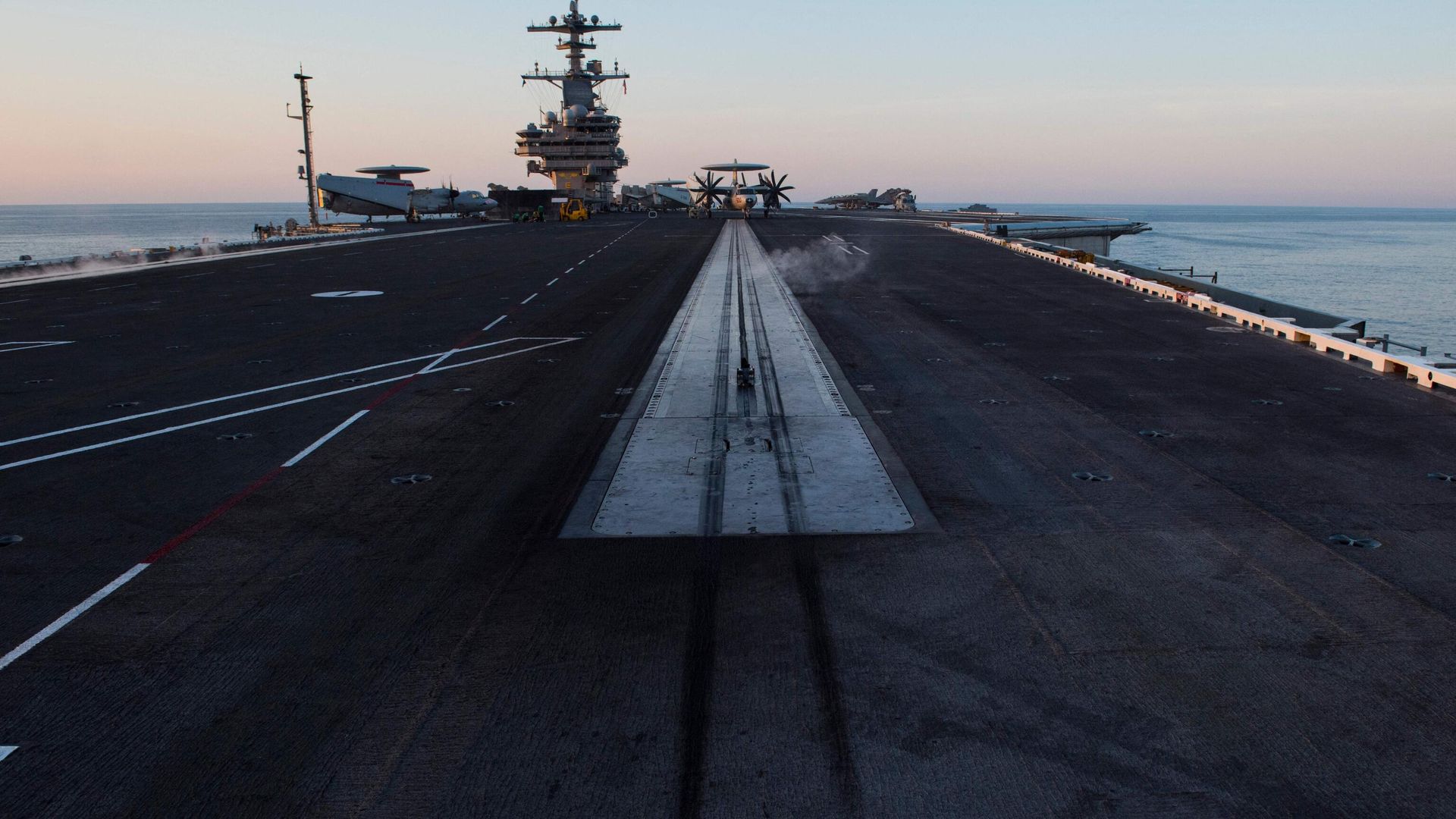 The end of the catapult runway is seen early in the morning on the deck of the the USS George H.W. Bush aircraft carrier during a deployment. File photo. - Sputnik International, 1920, 04.04.2023