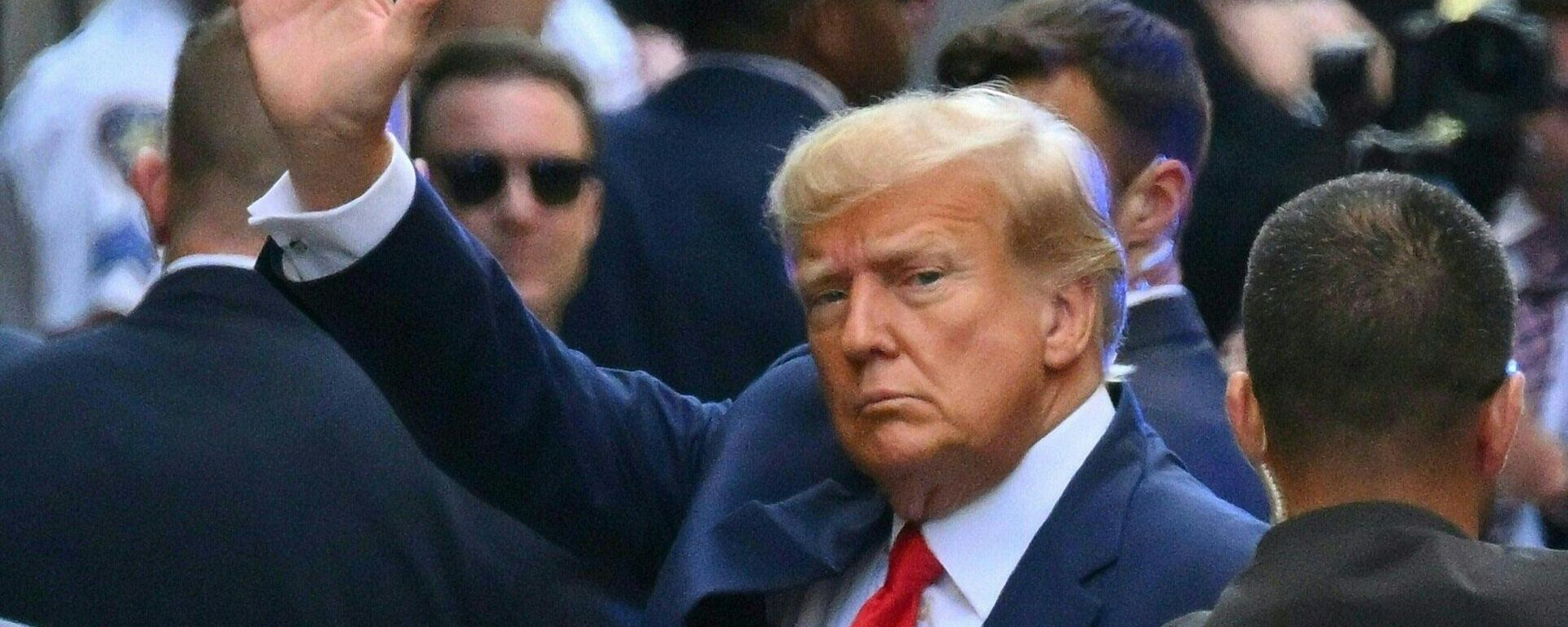 Former US president Donald Trump arrives ahead of his arraignment at the Manhattan Criminal Court in New York on April 4, 2023.  - Sputnik International, 1920, 07.04.2023