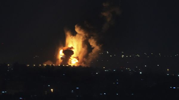 Smoke and fire rise from an explosion caused by an Israeli airstrike on Gaza City, early Friday, April 7, 2023. The Israeli military struck targets in the Gaza Strip early Friday, pushing the region closer toward a wider conflagration after a day of rocket fire along the country's northern and southern borders following two days of unrest at Jerusalem's most sensitive holy site. - Sputnik International