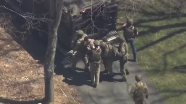 Image captures the arrest on April 13, 2023, by FBI officials of Jack Teixeira for the alleged unauthorized removal, retention and transmission of classified US defense information. - Sputnik International