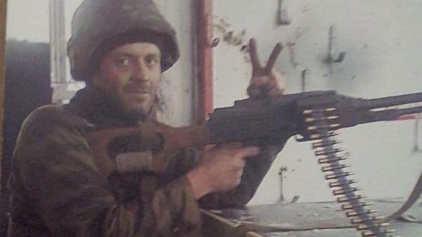 Donbass militia veteran Vitaly Shechkov at a checkpoint. From the fighter's personal photo archive. - Sputnik International