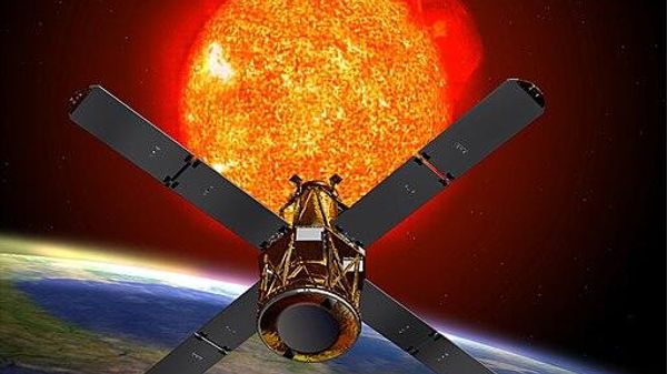An artists depiction of the RHESSI spacecraft observing the sun. - Sputnik International