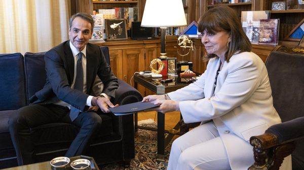 Greece's Prime Minister Kyriakos Mitsotakis, left, poses for a photo with Greek President Katerina Sakellaropoulou at the Presidential palace, in Athens, Saturday, April 22, 2023. Mitsotakis visited the Greek President to officially announce a general election on May 21. - Sputnik International