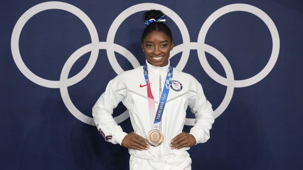 Simone Biles, of the United States, poses wearing her bronze medal from balance beam competition during artistic gymnastics at the 2020 Summer Olympics, Aug. 3, 2021, in Tokyo, Japan. President Joe Biden will present the nation’s highest civilian honor, the Presidential Medal of Freedom, to 17 people, at the White House next week. Simone Biles, of the United States, poses wearing her bronze medal from balance beam competition during artistic gymnastics at the 2020 Summer Olympics, Aug. 3, 2021, in Tokyo, Japan. President Joe Biden will present the nation’s highest civilian honor, the Presidential Medal of Freedom, to 17 people, at the White House next week. - Sputnik International