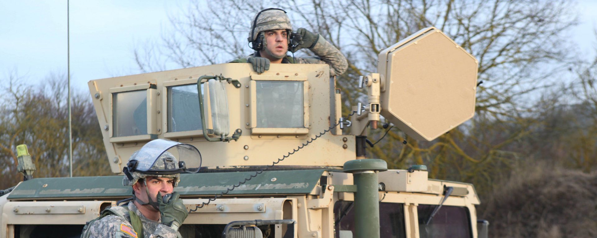 A US Soldier assigned to the 38th Cavalry Regiment talks on the radio during the Kosovo Force (KFOR) 18 Mission Rehearsal Exercise (MRE) at the Hohenfels Training Area in Germany Jan. 19, 2014. A US Soldier assigned to the 38th Cavalry Regiment talks on the radio during the Kosovo Force (KFOR) 18 Mission Rehearsal Exercise (MRE) at the Hohenfels Training Area in Germany Jan. 19, 2014. - Sputnik International, 1920, 04.09.2023