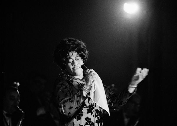 Famed jazz singer Ella Fitzgerald performs at the Empire Room at the Waldorf Astoria Hotel in New York, 1971.  Fitzgerald, known as the "First Lady of Song", "Queen of Jazz", and "Lady Ella", held a 60-year career. She collaborated with Louis Armstrong, Duke Ellington, and left behind numerous immortal hits, such as ""Dream a Little Dream of Me" and "Cheek To Cheek". - Sputnik International