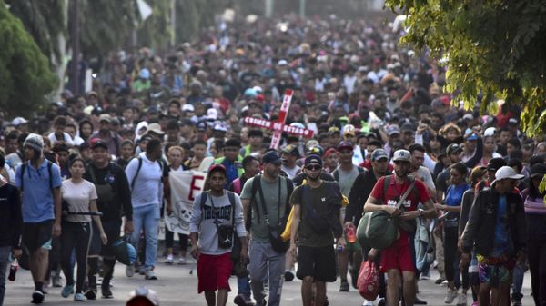 Migrants from Central and South America take part in a caravan attempting to reach the Mexico-US border, while carrying out a viacrucis to protest for the death of 40 migrants in a fire at a detention center in the northern city of Juarez, in Tapachula, Chiapas state, southern Mexico, on April 23, 2023 Migrants from Central and South America take part in a caravan attempting to reach the Mexico-US border, while carrying out a viacrucis to protest for the death of 40 migrants in a fire at a detention center in the northern city of Juarez, in Tapachula, Chiapas state, southern Mexico, on April 23, 2023 - Sputnik International