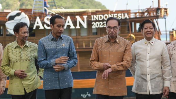 From left, Brunei's Sultan Hassanal Bolkiah, Indonesia's President Joko Widodo, Malaysia's Prime Minister Anwar Ibrahim and Philippine's President Ferdinand Marcos Jr. react during a photo session at the beginning of Brunei-Indonesia-Malaysia-Philippines East ASEAN Growth Area (BIMP-EAGA) summit on the sidelines of the 42nd ASEAN Summit in Labuan Bajo, East Nusa Tenggara province, Indonesia, Thursday, May 11, 2023. - Sputnik International