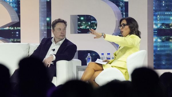 FILE - Twitter CEO Elon Musk, center, speaks with Linda Yaccarino, chairman of global advertising and partnerships for NBC, at the POSSIBLE marketing conference, Tuesday, April 18, 2023, in Miami Beach, Fla. FILE - Twitter CEO Elon Musk, center, speaks with Linda Yaccarino, chairman of global advertising and partnerships for NBC, at the POSSIBLE marketing conference, Tuesday, April 18, 2023, in Miami Beach, Fla. - Sputnik International