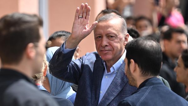 Turkish President Tayyip Erdogan walks at a polling station to vote during the presidential and parliamentary elections Turkish President Tayyip Erdogan walks at a polling station to vote during the presidential and parliamentary elections - Sputnik International