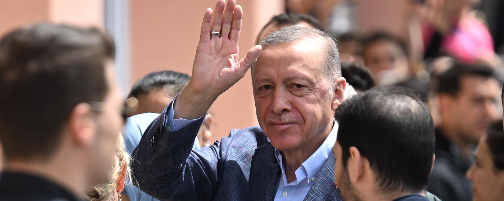 Turkish President Tayyip Erdogan walks at a polling station to vote during the presidential and parliamentary elections - Sputnik International, 1920, 28.05.2023