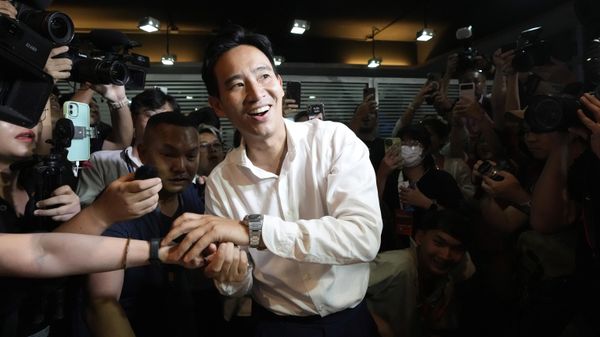 Leader of Move Forward Party Pita Limjaroenrat shakes hand with a supporter as he leaves from Move Forward Party headquarters in Bangkok, Thailand, Sunday, May 14, 2023. Thailand's main opposition party took an early lead in a vote count from Sunday's general election, touted as a pivotal chance for change nine years after incumbent Prime Minister Prayuth Chan-ocha first came to power in a 2014 coup. - Sputnik International