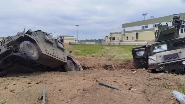 Screengrab of Russian Defense Ministry video showing aftermath of attempted Ukrainian assault in Belgorod region. - Sputnik International