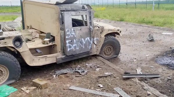 Wrecked military vehicle used by Ukrainian militants during their attack on Russia's Belgorod Region - Sputnik International