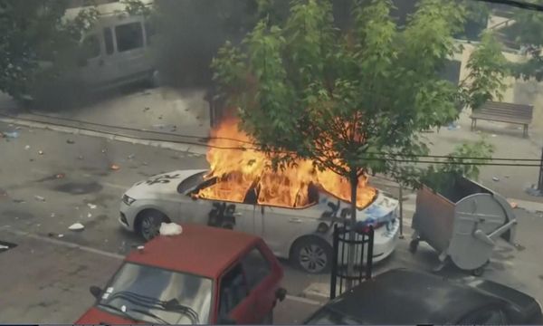 In this grab taken from a video, a view of a car set on fire as KFOR soldiers clash with Kosovo Serbs in the town of Zvecan, northern Kosovo. - Sputnik International