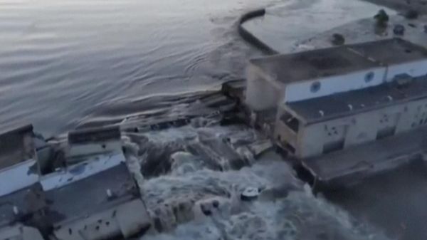 This image made from video provided by Ukraine's Presidential Office shows the damaged Kakhovka dam near Kherson, Ukraine, Tuesday, June 6, 2023. - Sputnik International
