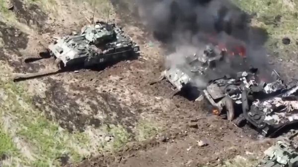 The Russian Ministry of Defense has published footage of destroyed armored vehicles of the Ukrainian armed forces, including German Leopard tanks and American Bradley infantry fighting vehicles - Sputnik International