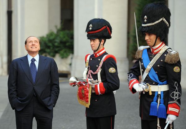 Berlusconi's endeavors in the real estate sector allowed him to amass considerable wealth by the 1970s.Above: Silvio Berlusconi waits for Palestinian president Mahmud Abbas. - Sputnik International