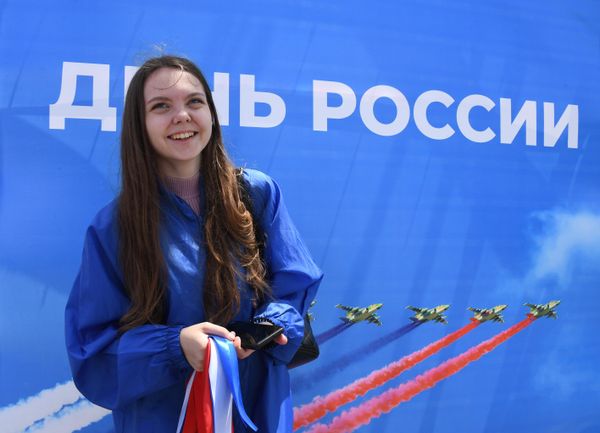 The holiday's official name, "Russia Day," was formally adopted in 2002.Above: Girl participates in the Russia Day celebrations in Vladivostok. - Sputnik International
