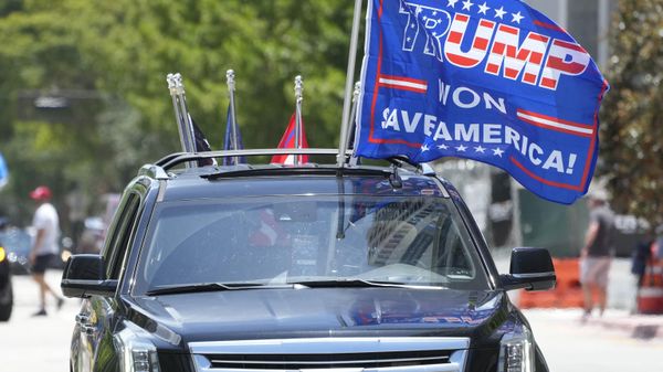 Supporters of former President Donald Trump, drive near the Wilkie D. Ferguson Jr. U.S. Courthouse, Tuesday, June 13, 2023, in Miami. Trump is making a federal court appearance today on dozens of felony charges accusing him of illegally hoarding classified documents and thwarting the Justice Department's efforts to get the records back.  - Sputnik International