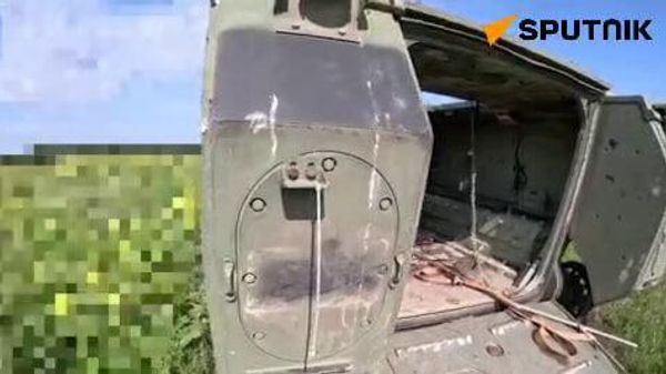 A Russian reconnaissance group filmed destroyed Ukrainian armored vehicles - Sputnik International