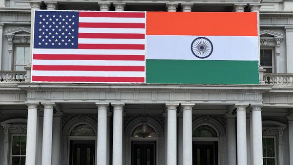Flags of India and US adorn the Eisenhower Executive Office Building   of the White House in Washington, DC on June 20, 2023. US President Joe Biden will be hosting India's Prime Minister Narendra Modi for a State visit on June 22, 2023. - Sputnik International
