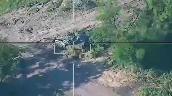 The Russian Ministry of Defense has released a video showing a Russian Lancet drone strike a Ukrainian Bulat tank in the South Donetsk direction.  - Sputnik International