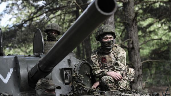 A Russian serviceman is seen in the course of Russia's military operation in Ukraine, at the unknown location. - Sputnik International