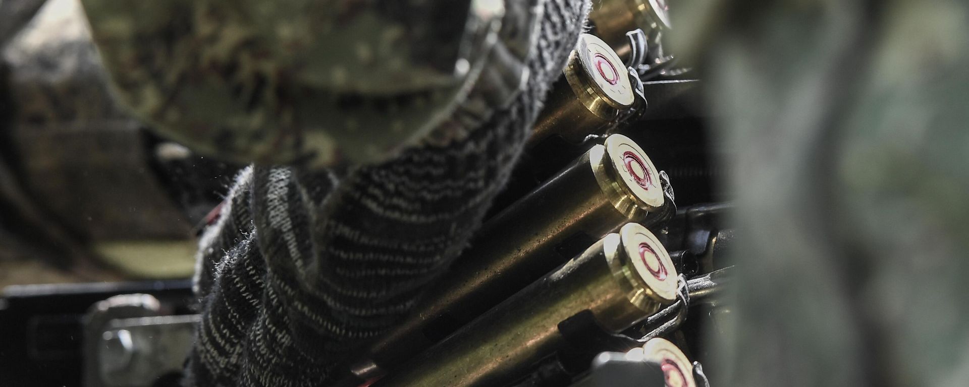 A Russian serviceman of a mobile anti-aircraft unit loads ammunition for a DShK machine gun on the back a UAZ truck as he is on combat duty for repelling attacks of Ukrainian unmanned aerial vehicles in the course of Russia's military operation in Ukraine A Russian serviceman of a mobile anti-aircraft unit loads ammunition for a DShK machine gun on the back a UAZ truck as he is on combat duty for repelling attacks of Ukrainian unmanned aerial vehicles in the course of Russia's military operation in Ukraine - Sputnik International, 1920, 25.08.2023