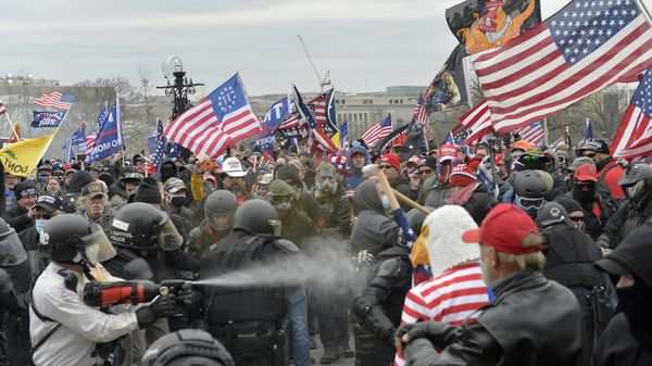 Trump supporters clash with police and security forces as people try to storm the US Capitol Building in Washington, DC, on January 6, 2021 - Sputnik International