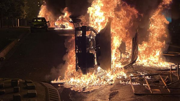 Burning vehicles are seen during clashes between protesters and police, after the death of Nahel, a 17-year-old teenager killed by a French police officer during a traffic stop, in Nanterre, Paris suburb, France. - Sputnik International