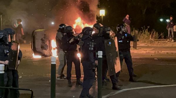 Police officers are seen during clashes between protesters and police, after the death of Nahel, a 17-year-old teenager killed by a French police officer during a traffic stop, in Nanterre, Paris suburb, France. - Sputnik International