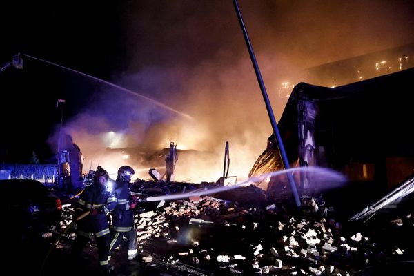 Firefighters douse the flames of a building set on fire during protests in Roubaix, northern France, three days after a teenager was shot dead during a traffic stop in the Paris suburb of Nanterre.  - Sputnik International