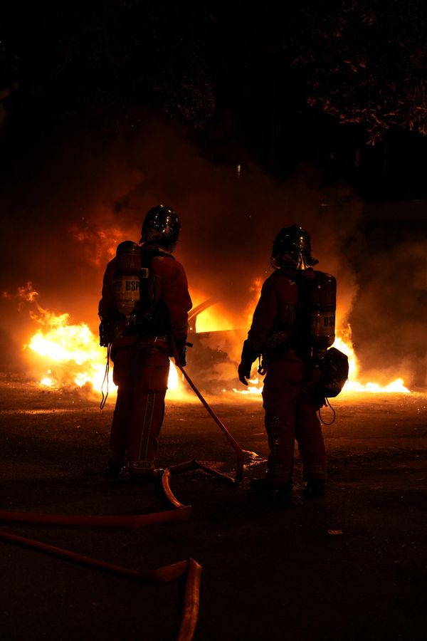 French firefighters extinguish burning vehicles following protests in Nanterre, west of Paris, a day after a 17-year-old boy was shot. - Sputnik International