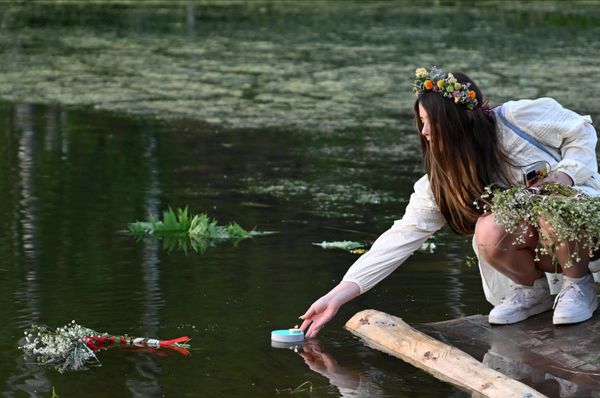 The holiday is a time for community gatherings and a celebration of summer and nature.Above: A participant of the celebration of Kupala Night in the park in Zelenodolsk. - Sputnik International