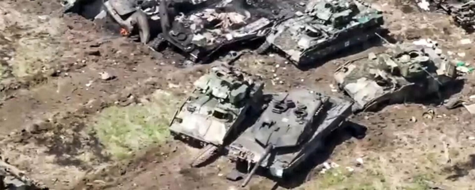 Leopard 2 and Bradley pictured among destroyed and damaged Ukrainian vehicles. Screenshot of Russian Defense Ministry video. - Sputnik International, 1920, 27.07.2023