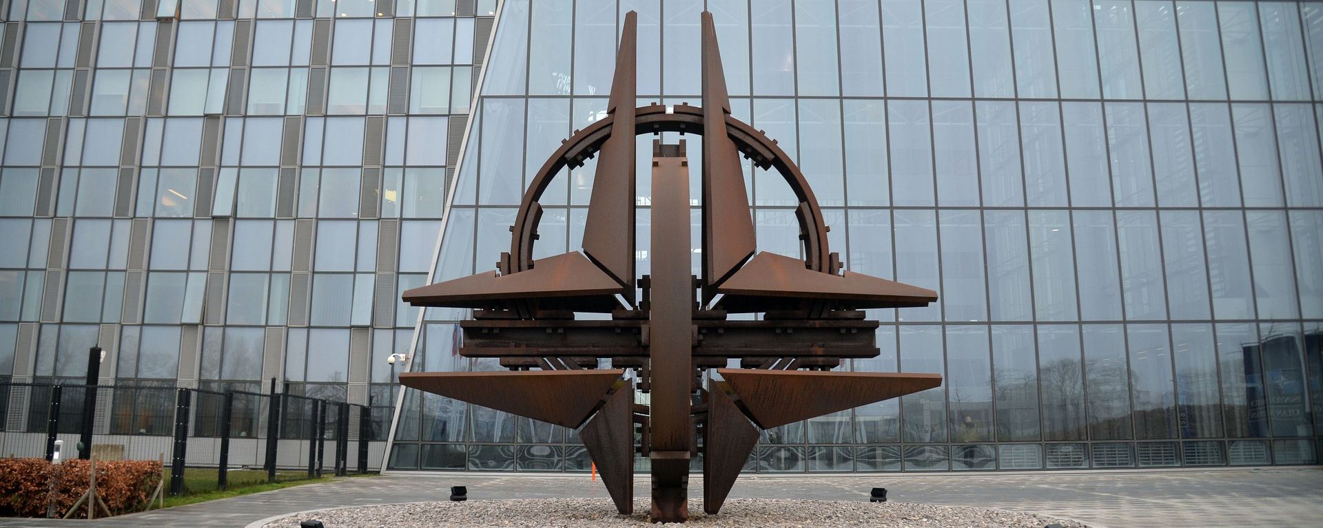 The NATO logo in front of the headquarters of the North Atlantic Treaty Organization in Brussels The NATO logo in front of the headquarters of the North Atlantic Treaty Organization in Brussels - Sputnik International, 1920, 25.12.2024