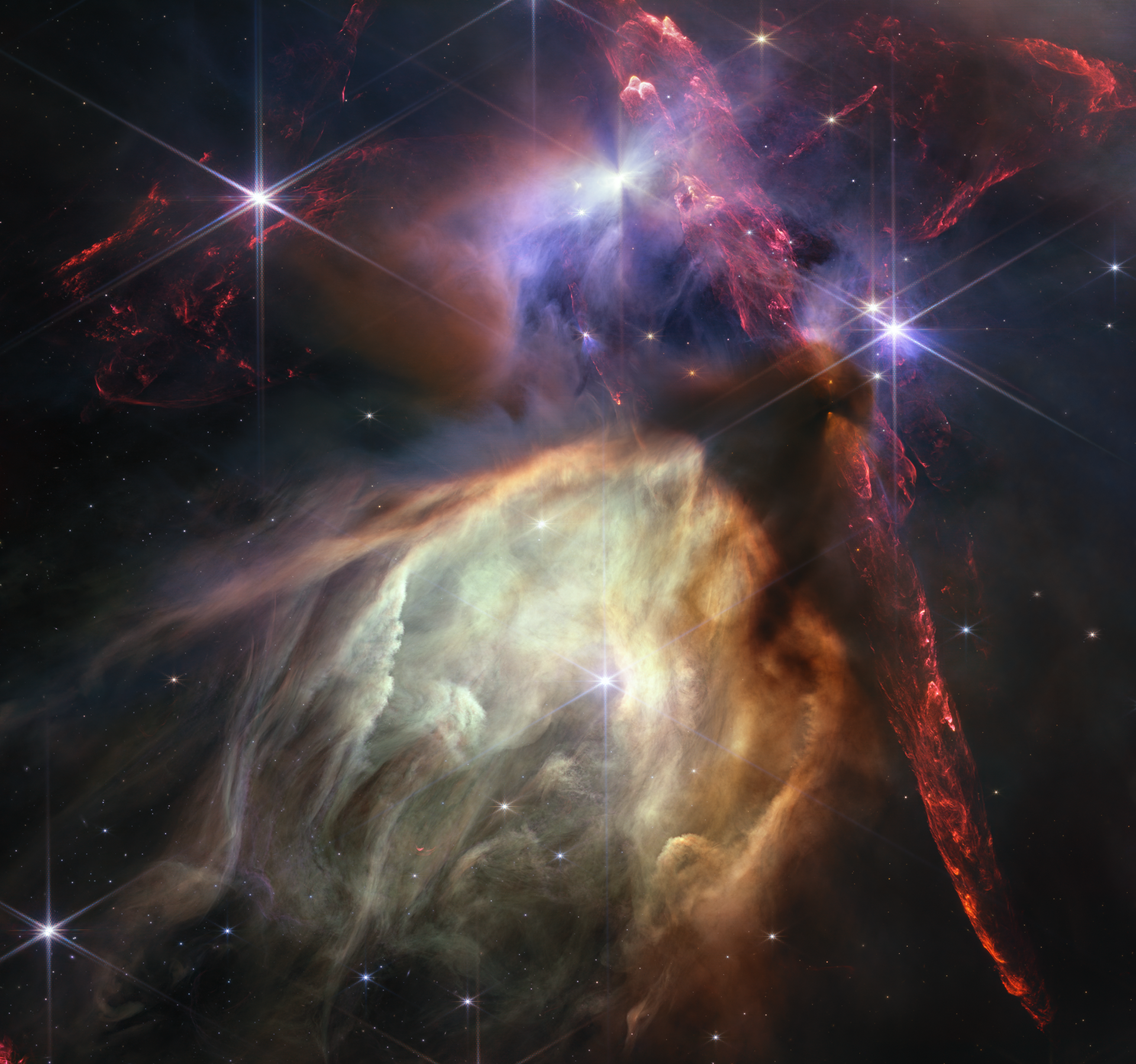 The first anniversary image from NASA’s James Webb Space Telescope displays star birth like it’s never been seen before, full of detailed, impressionistic texture. The subject is the Rho Ophiuchi cloud complex, the closest star-forming region to Earth. It is a relatively small, quiet stellar nursery, but you’d never know it from Webb’s chaotic close-up. Jets bursting from young stars crisscross the image, impacting the surrounding interstellar gas and lighting up molecular hydrogen, shown in red. Some stars display the telltale shadow of a circumstellar disk, the makings of future planetary systems. The first anniversary image from NASA’s James Webb Space Telescope displays star birth like it’s never been seen before, full of detailed, impressionistic texture. The subject is the Rho Ophiuchi cloud complex, the closest star-forming region to Earth. It is a relatively small, quiet stellar nursery, but you’d never know it from Webb’s chaotic close-up. Jets bursting from young stars crisscross the image, impacting the surrounding interstellar gas and lighting up molecular hydrogen, shown in red. Some stars display the telltale shadow of a circumstellar disk, the makings of future planetary systems. - Sputnik International, 1920, 12.07.2023