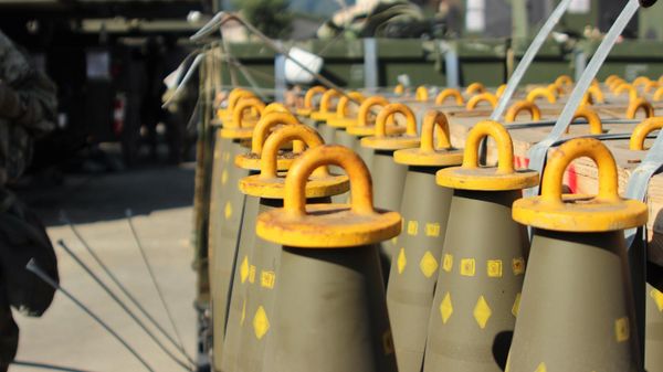 Bands broken, dozens of 155mm Base Burn Dual Purpose Improved Conventional Munitions rounds wait to be loaded into M109A6 Paladin self-propelled howitzers and M992 Field Artillery Support Vehicles Sept. 20 at the Alpha Battery, 1st Battalion, 82nd Field Artillery Regiment, 1st Armored Brigade Combat Team, 1st Cavalry Division motor pool at Camp Hovey, South Korea. - Sputnik International