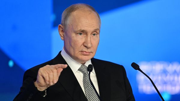 Russian President Vladimir Putin delivers a speech during a plenary session of the Future Technologies Forum at the World Trade Center in Moscow, Russia. - Sputnik International