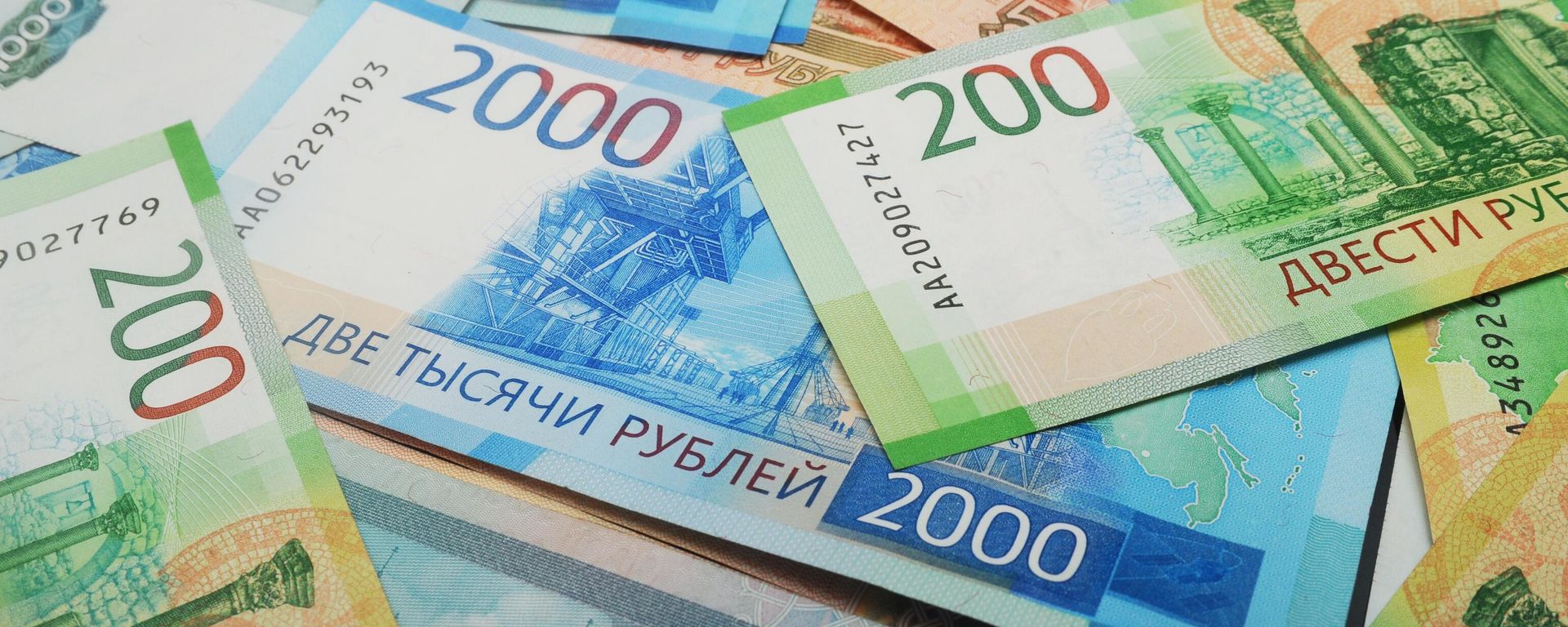 The 200 and 2000 ruble banknotes. - Sputnik International, 1920, 09.06.2025
