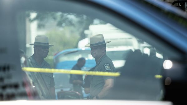 New York State police officers stand guard as law enforcement searches the home of Rex Heuermann, Saturday, July 15, 2023, in Massapequa Park, N.Y. - Sputnik International