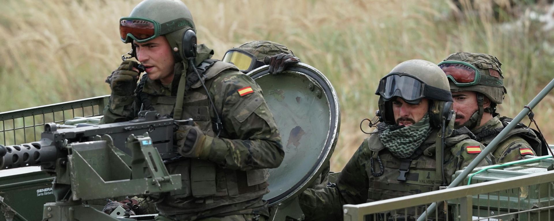 Spain's soldiers ride their military vehicle during the NATO military exercises ''Namejs 2021.'' - Sputnik International, 1920, 16.07.2023