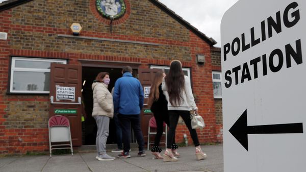 FILE - People queue at the entrance of a polling station in London, on May 6, 2021. Britain’s electoral watchdog said Friday, June 23, 2023 that about 14,000 people were prevented from voting in last month’s local elections because of a new law requiring voters to show photo identification.The Electoral Commission said 0.25% of people who went to polling stations were unable to cast ballots because they didn’t have the right ID, and “significantly more” than that likely did not show up at all. - Sputnik International