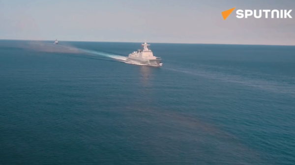 Sailors of the Russian Navy and the Chinese Navy perform joint artillery firing at the North/Interaction - 2023 joint naval exercise - Sputnik International