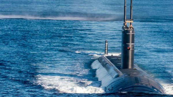 In this photo provided by South Korea Defense Ministry, the USS Ronald Reagan aircraft carrier and the USS nuclear-powered submarine USS Annapolis participate in a joint anti-submarine drill between South Korea, the United States and Japan in waters off South Korea's eastern coast, file photo. - Sputnik International