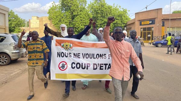 Supporters of Nigerien President Mohamed Bazoum demonstrate in his support in Niamey, Niger, Wednesday July 26, 2023. Governing bodies in Africa condemned what they characterized as a coup attempt Wednesday against Niger's president, whose official Twitter account reported that elements of the presidential guard engaged in an anti-Republican demonstration and tried to obtain the support of other security forces.  - Sputnik International