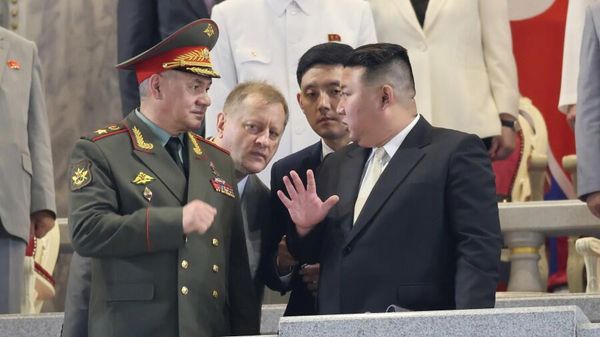 Russian Defense Minister Sergei Shoigu is seen talking to North Korean leader Kim Jong Un. Russian Defense Minister Sergei Shoigu is seen talking to North Korean leader Kim Jong Un. - Sputnik International
