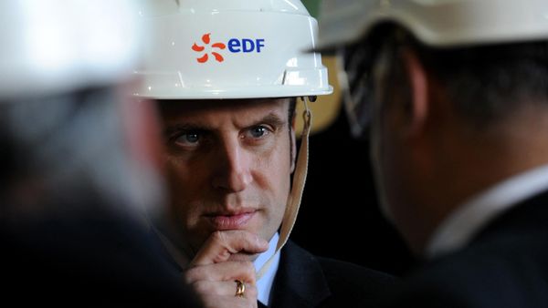 Emmanuel Macron wearing a French state-owned electric utility company EDF helmet during a visit to the Civaux nuclear power plant. File photo. - Sputnik International