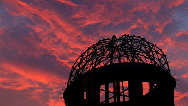 In this Aug. 5, 2013, file photo, the Atomic Bomb Dome is silhouetted at sunset in Hiroshima, western Japan.  - Sputnik International